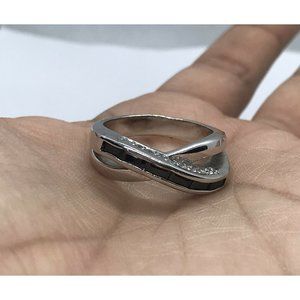 Silver tone crossover design  with black and clear crystals ring size 8.5